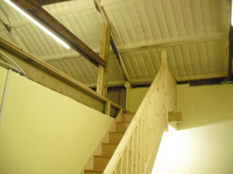 The interior stairs to the high level storage area.
